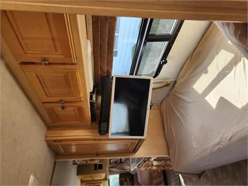 12 TV, DVD-Sound Bar in Bedroom